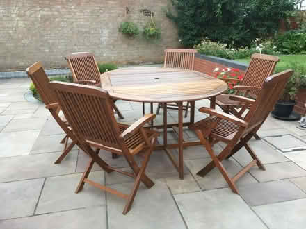 Photo of free external hardwood table with 6 chairs and umbrella (Scunthorpe DN15) #1