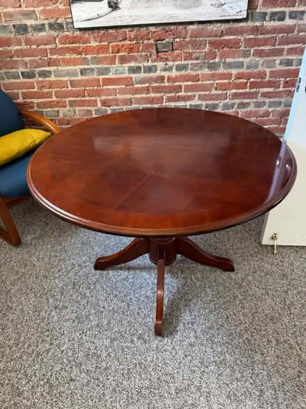Photo of free Round wooden table (344 Nassau St, Princeton) #1