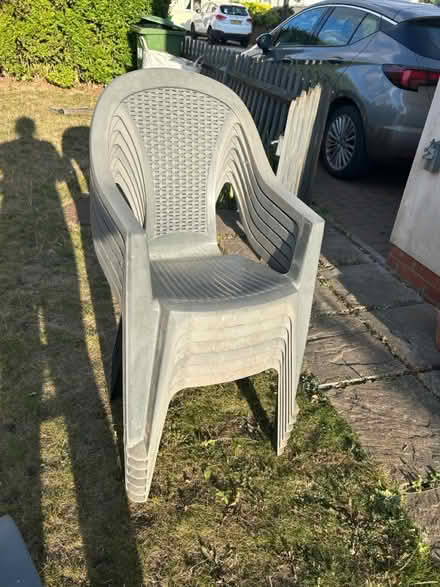 Photo of free 6 plastic garden chairs (UB7 9EF) #3