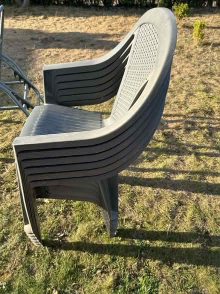 Photo of free 6 plastic garden chairs (UB7 9EF) #1