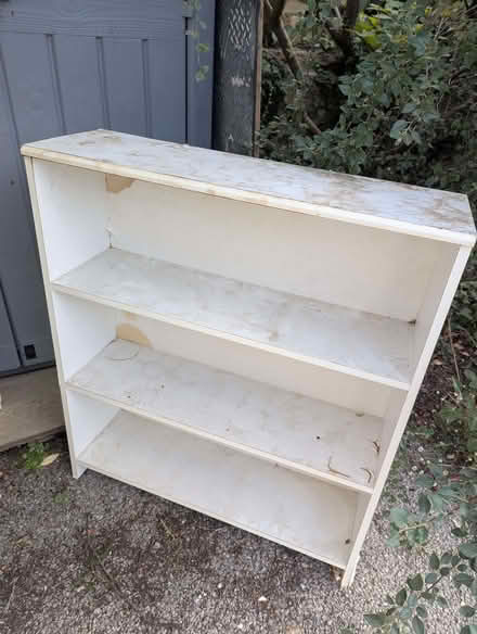 Photo of free Scruffy melamine bookcase (Headington OX3) #1