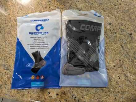 Photo of free Handbag and compression socks (Cypress off Jones and Cy N Hou) #1