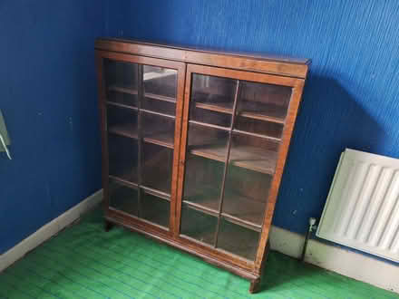 Photo of free Glass fronted book/display case with key (Oakdale BH15) #1
