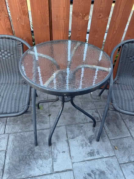 Photo of free Black bistro set (two seats and table) (Longbrnton NT NE12) #1