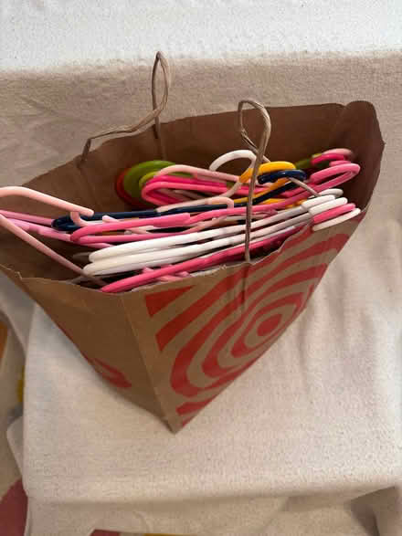 Photo of free Child size plastic clothes hangers (Piney Orchard) #1
