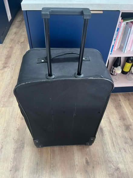 Photo of free Large black suitcase (Tooting SW17) #2