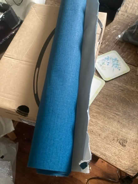 Photo of free Roll of textured teal wallpaper (RG1) #1