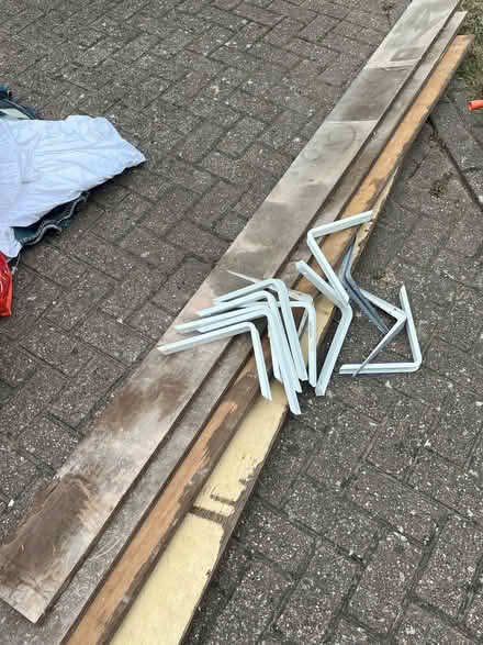 Photo of free 4 shelves 245cm long by 20cm wide (Frimley Green GU16) #1