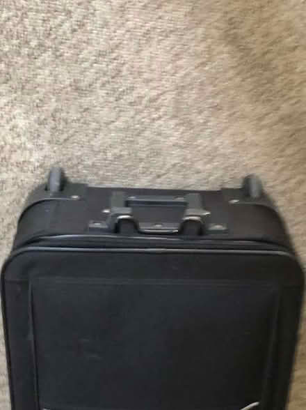 Photo of free Black suitcase (Purley CR8) #2