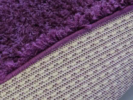 Photo of free Large shaggy purple rug (Thorpe St Andrew NR7) #2