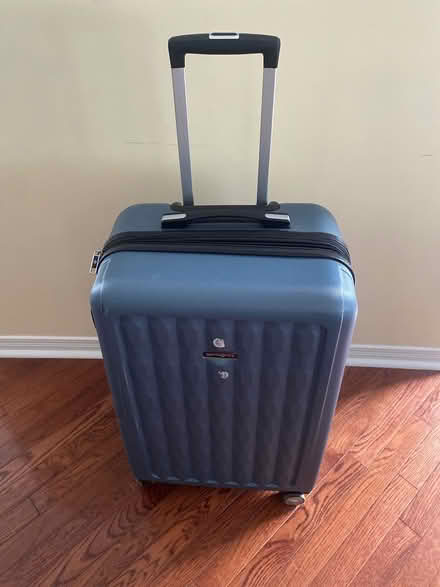 Photo of free Samsonite suitcase 23.5” x 16” (Orleans) #2