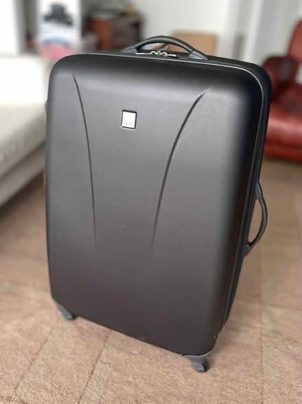 Photo of free Suitcase. Hard shell. Grey. Good condition. (Crouch End N6) #1