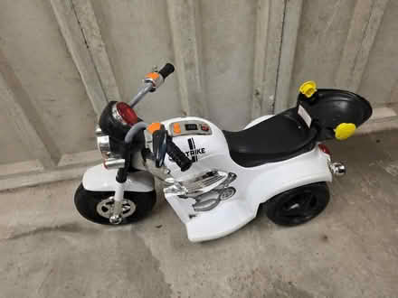 Photo of free Kids 2 - 4 yrs electric police motorbike working b (Broughton Park M8) #1