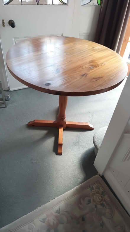 Photo of free Solid round topped pine table (Heswall CH60) #1