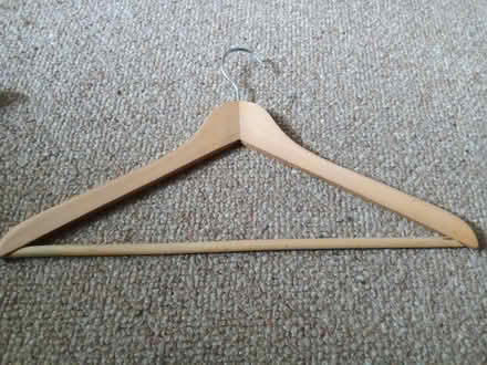Photo of free Wooden clothes hangers (Dent LA10) #1