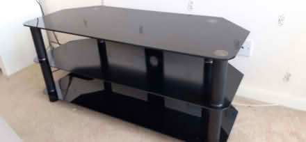 Photo of free TV stand - black glass (Prince of Wales Steps TQ1) #1