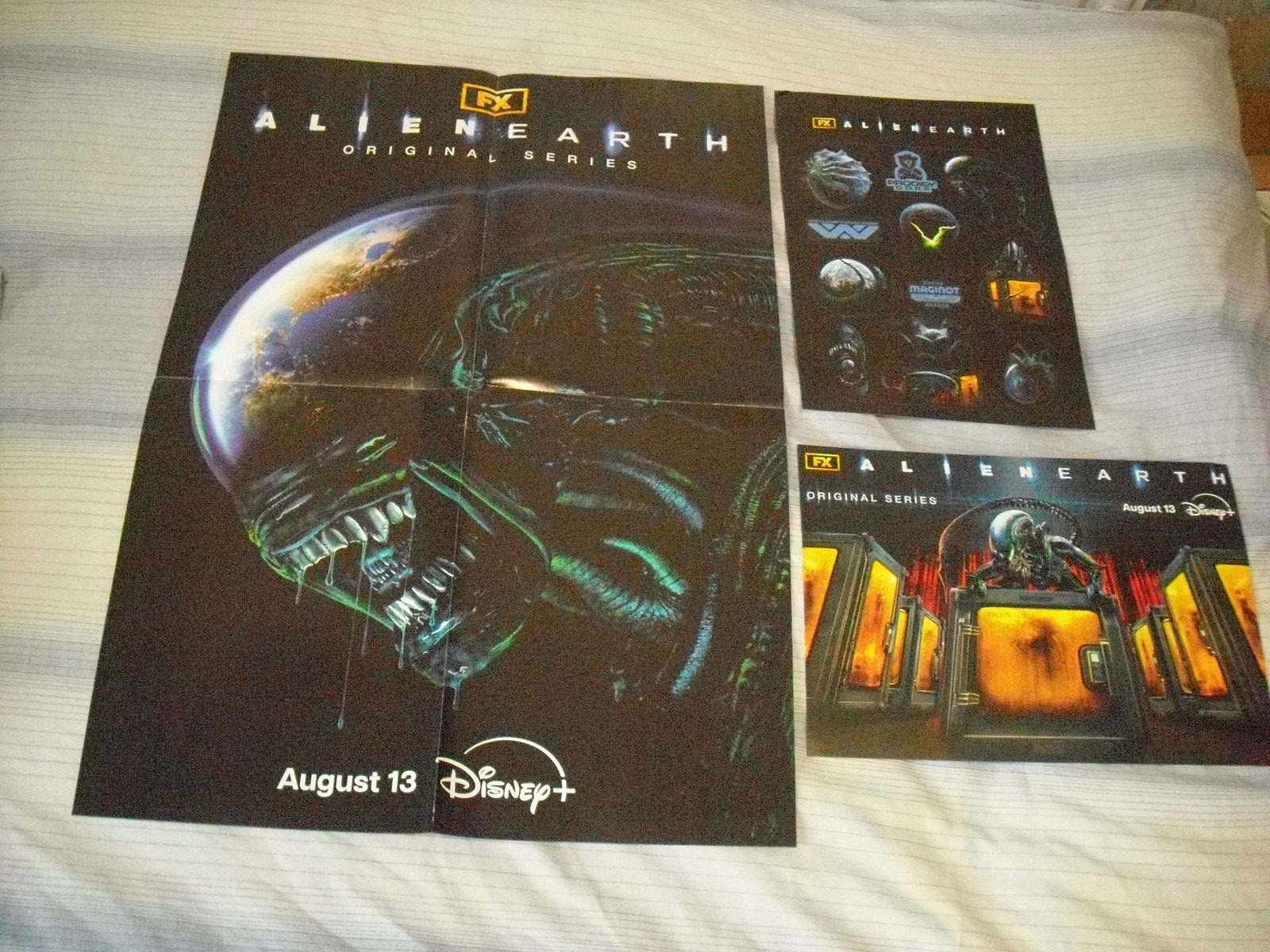 Free: 2 Posters for Alien Earth and stickers unused as seen in pic ...