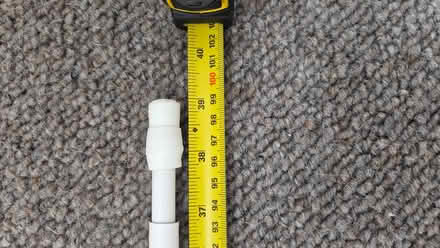 Photo of free White spring loaded tension curtain rod (Barwick-in-Elmet LS15) #3