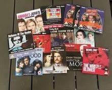 Photo of free CDs and DVDs, were Daily Mail gifts. CDs are misc music (Lydiard Millicent SN5) #1