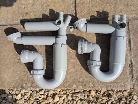 Photo of free Pair of one-piece kitchen sink waste plumbing kits (Purton SN5) #1