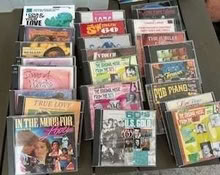 Photo of free CDs and DVDs, were Daily Mail gifts. CDs are misc music (Lydiard Millicent SN5) #3