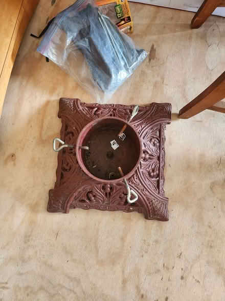 Photo of free Red Xmas tree stand (Maple Leaf / Northgate) #1
