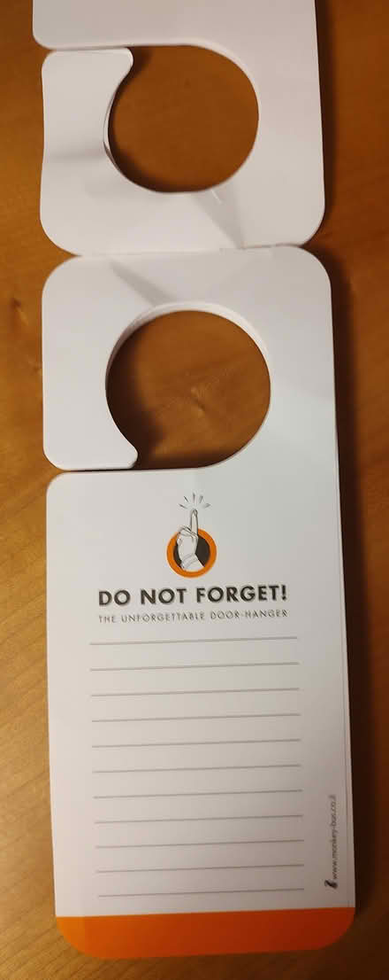 Photo of free "Do Not Forget" paper doorhangers ((south) Central Park - Denver) #1