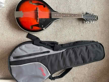 Photo of free Two mandolins and one case (Little Herberts GL53) #1