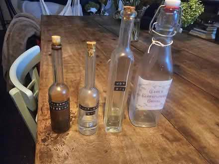Photo of free 4 storage bottles (SW8) #1