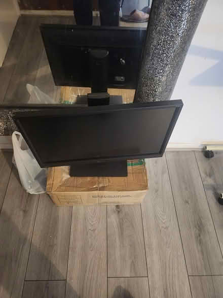 Photo of free Round glass table and 2 monitors (SE17) #3