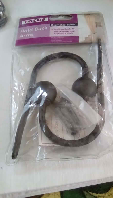 Photo of free Curtain pole attachments (Priorslee TF2) #2