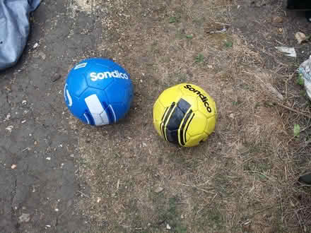 Photo of free Two footballs. (Huntingdon PE29) #1