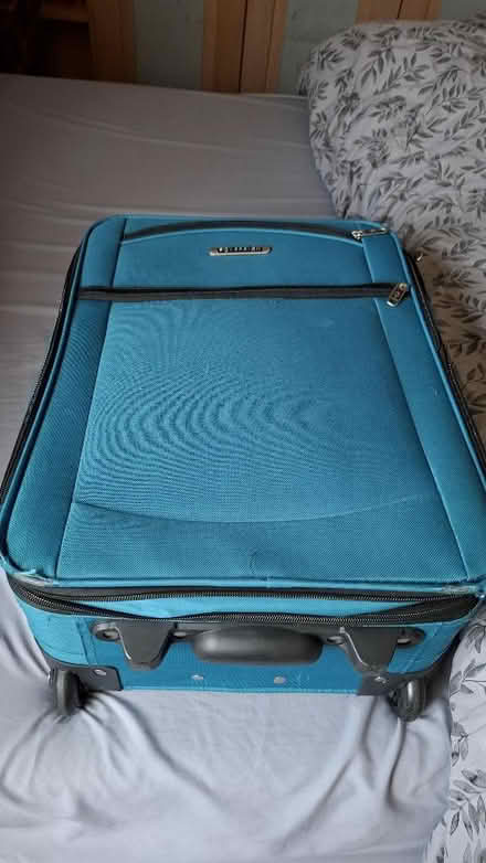 Photo of free Bright blue soft body suitcase w/wheels (Broomridge FK7) #1
