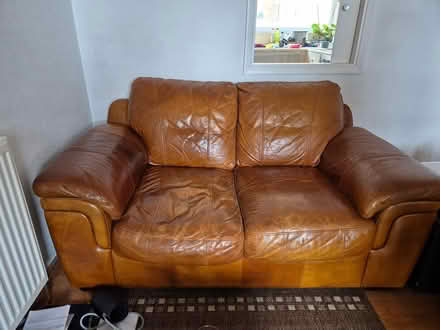 Photo of free Tan leather sofa (Liden, SN3) #1