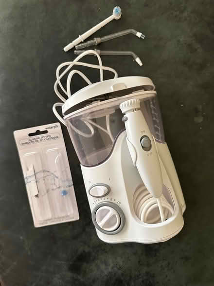 Photo of free Waterpik with unused tips (Hollenbeck and Remington) #1