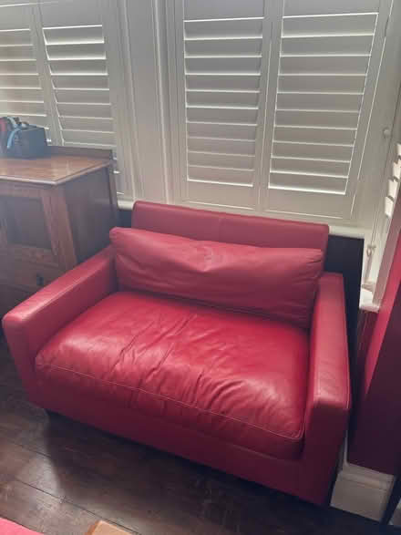 Photo of free Love seat armchair red leather (Surrenden BN1) #1