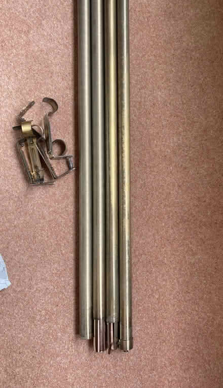 Photo of free Two 3 metre long antique brass effect curtain poles (Willingdon BN20) #1