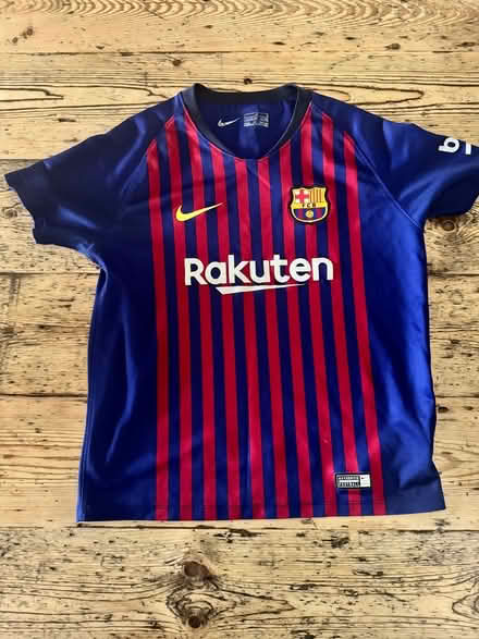 Photo of free Barcelona football kit top/ age 6-7 (Teddington TW11) #1