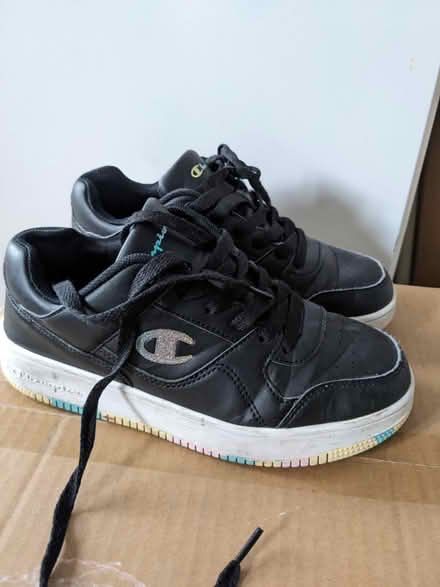 Photo of free Black school trainers, size 4 (Wood Street) #1