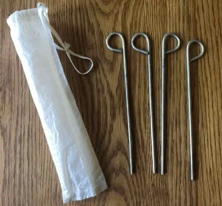Photo of free bag of 4 metal tent or shelter stakes [20886] #1