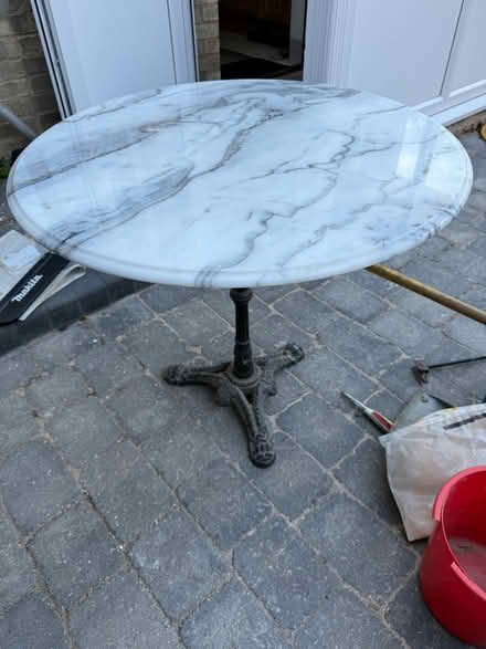 Photo of free Circular marble and cast iron table (Matlock DE4) #1