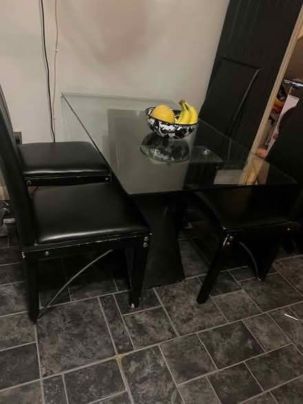 Photo of free Tempered glass top table with black cross base and 4 chairs (Dickens Heath B90) #1