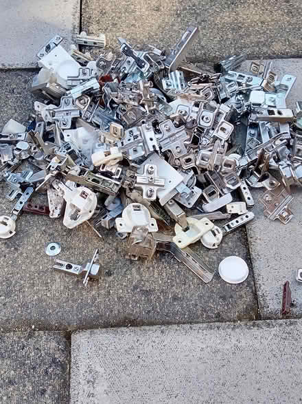 Photo of free Bucketful of various size hinges (Hucknall NG15) #1