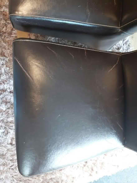 Photo of free 2×faux leather dining room chairs (Holtspur bucks) #2