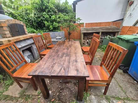 Photo of free Solid teak table and six chairs (Altrincham WA15) #1