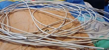 Photo of free NET CURTAIN WIRES complete with hooks and eyes (New Brighton CH45) #1