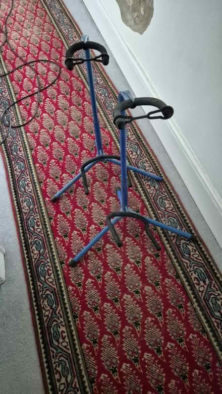 Photo of free 2 x guitar stands,1 missing end cap (EX13) #1