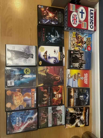 Photo of free DVD's and books and one game which is Finnish one. (GU14) #1
