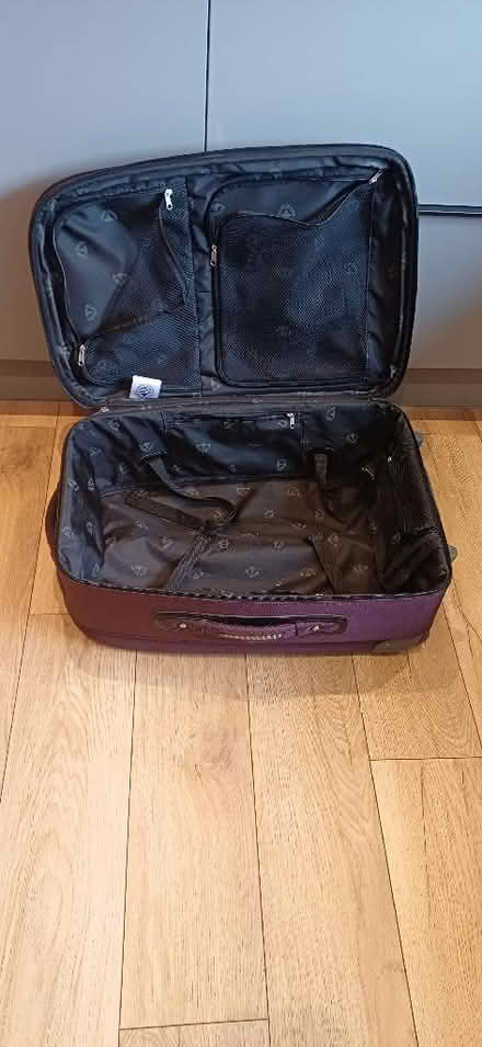 Photo of free Large suitcase (Trefor LL65) #2