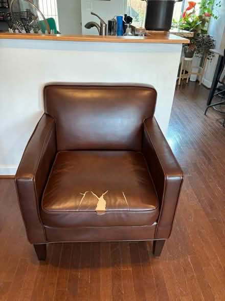Photo of free Faux leather arm chair (Capitol Hill, Duncan St NE) #1